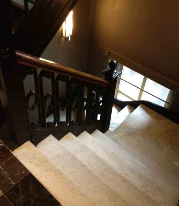 a staircase with a railing