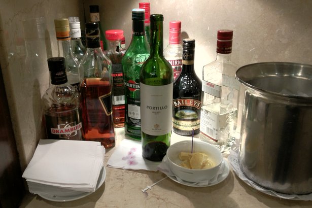 a group of bottles of alcohol on a table