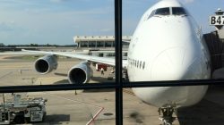 a large white airplane at an airport