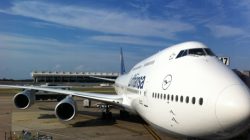 a large white airplane at an airport