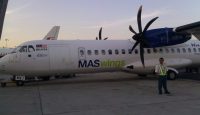 a large airplane with a propeller