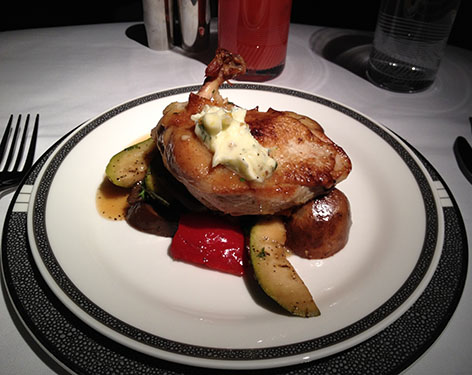 picture of a plate of chicken and vegetables