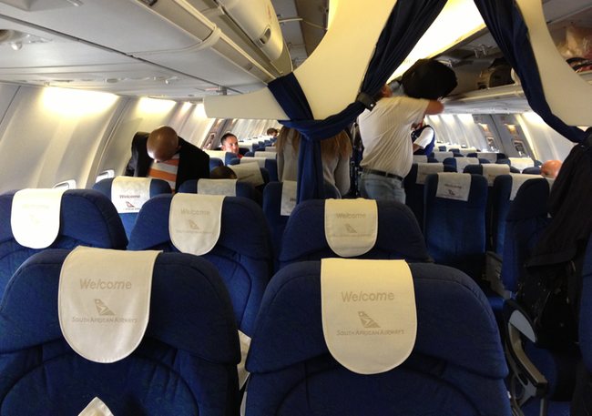 a group of people in an airplane
