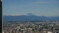 a city with a mountain in the background