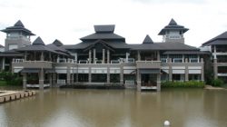 a large building with a large body of water