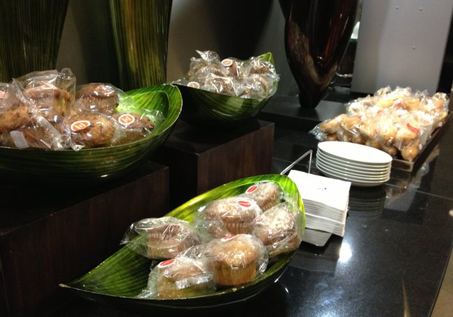 a group of food in a green bowl