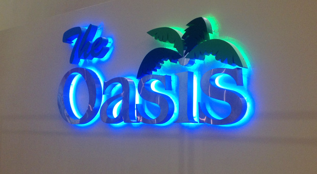 Signage outside the Oasis Lounge