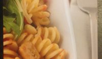 a plate of pasta and a fork