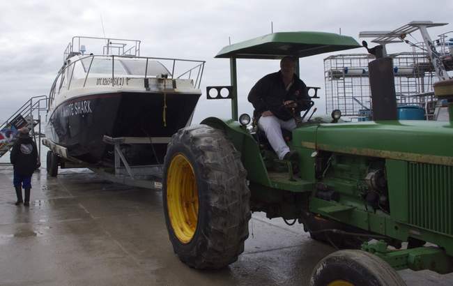 a man driving a tractor