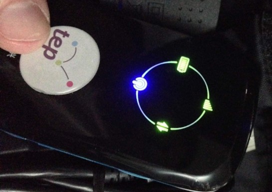 a close-up of a phone with a button