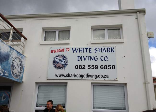 a sign on the side of a building
