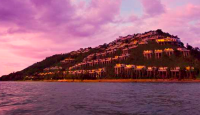 a group of buildings on a hill