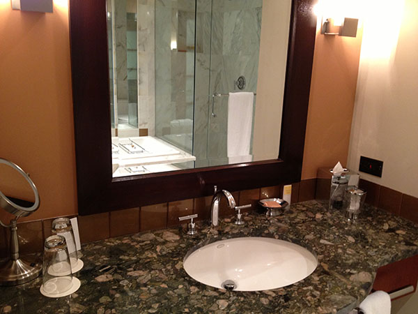 picture of hotel bathroom sink and mirror
