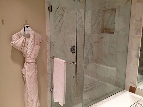 picture of hotel shower and bathrobe