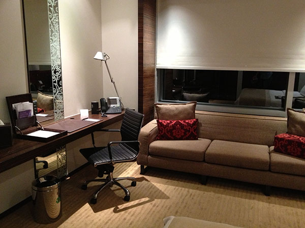 picture of hotel couch and desk