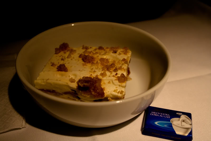 a bowl of food and a packet of milk
