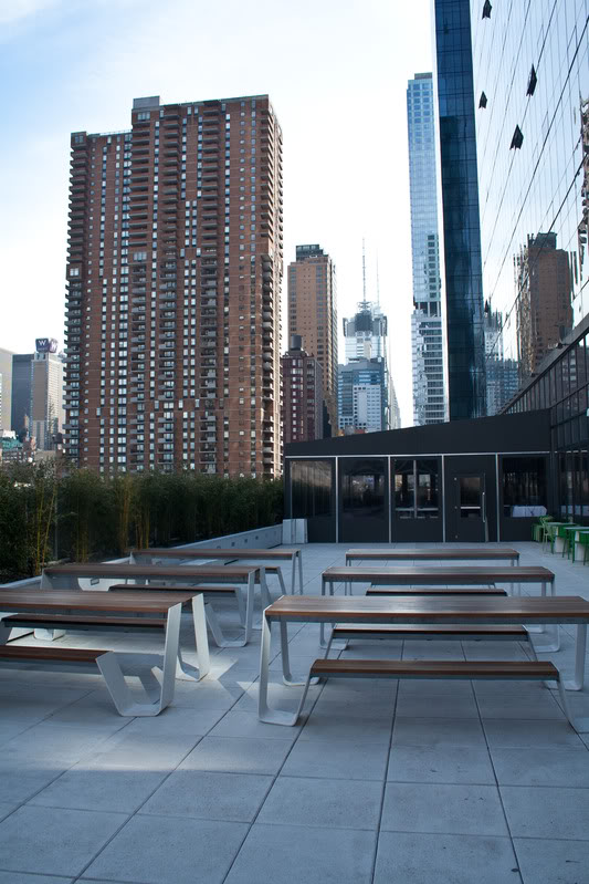 a group of benches on a rooftop