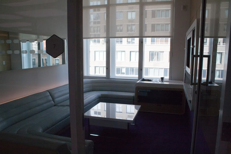 a room with a couch and a tv