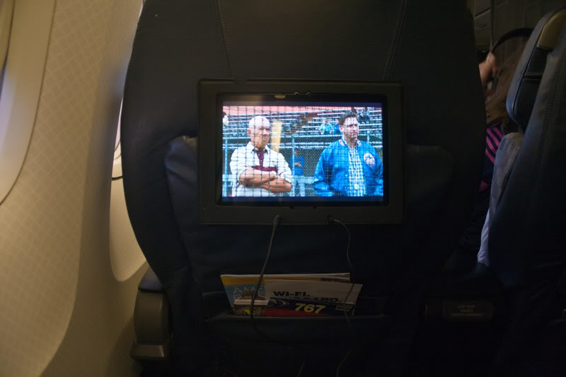 a tv on the back of a seat