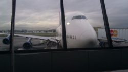 a large white airplane in an airport
