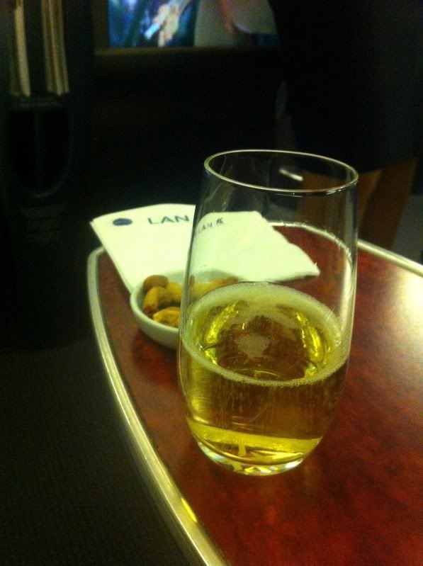 a glass of beer on a table