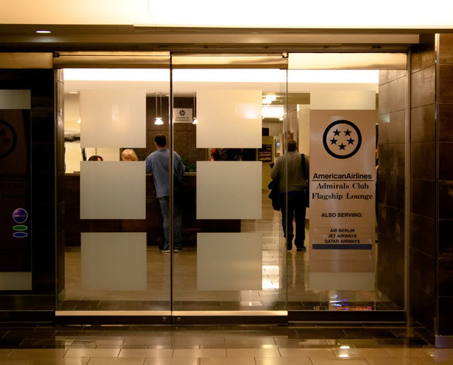 a glass doors with white squares on them