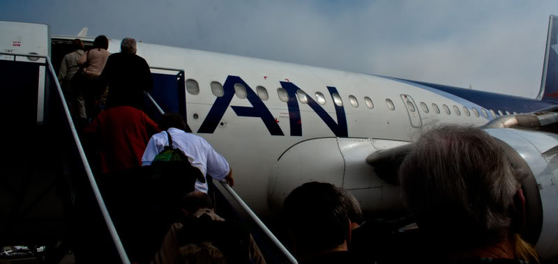 people boarding an airplane