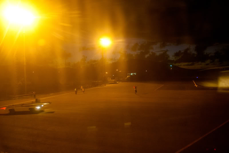 a street with cars and people on it