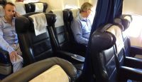 a group of people sitting in a plane