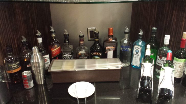 a group of bottles of alcohol on a table