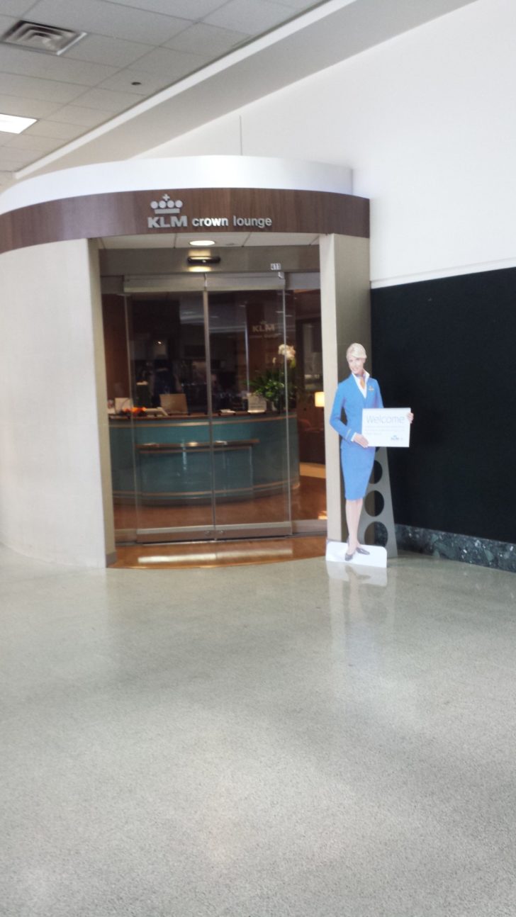 a statue of a woman in a blue dress