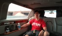 a man sitting in a car