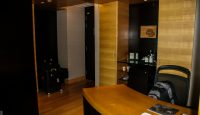 a room with a desk and a chair