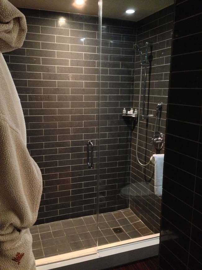 a shower with a glass door