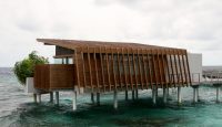 a building on stilts in water