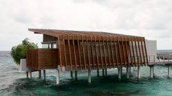 a building on stilts in water