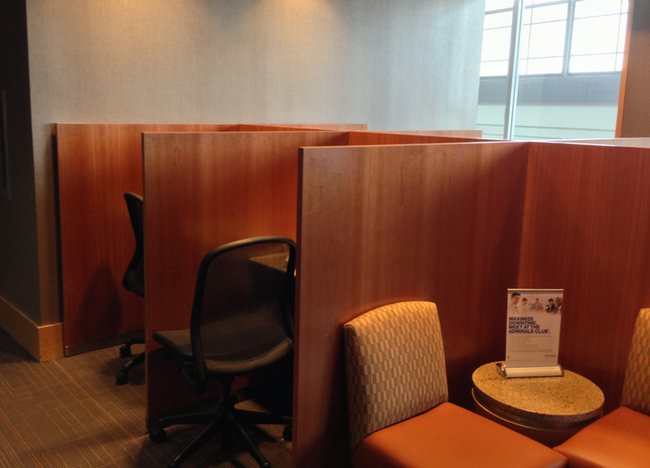 a room with chairs and tables