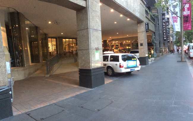 a car parked in front of a building