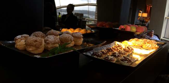 a tray of pastries and pastries on a table