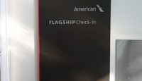 a black sign with white text on it