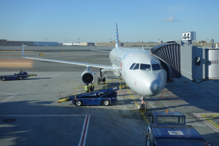 Airbus A321T with jetway at Door 1L