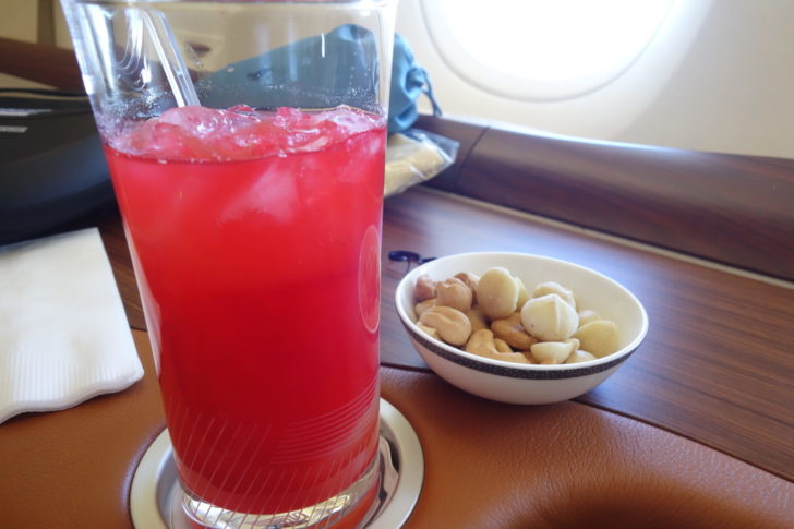 Singapore Sling and macadamia nuts