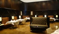 a restaurant with tables and chairs