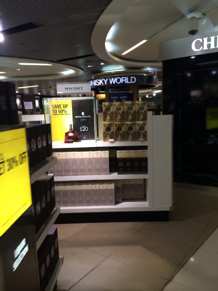 The extensive duty free selection of whiskeys before baggage claim.