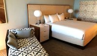 a bed and a couch in a hotel room