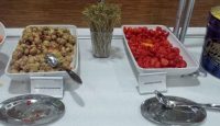 a table with bowls of food