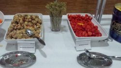 a table with bowls of food