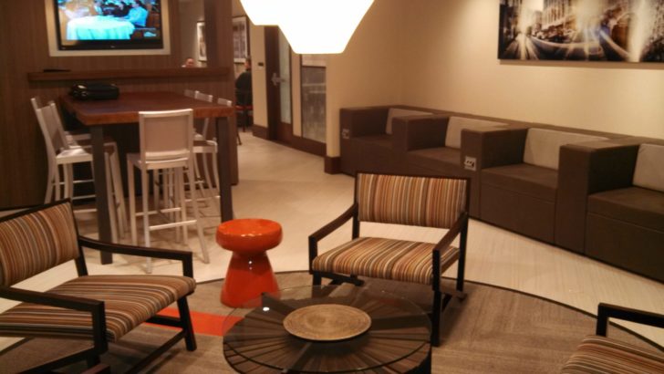 a room with chairs and a table