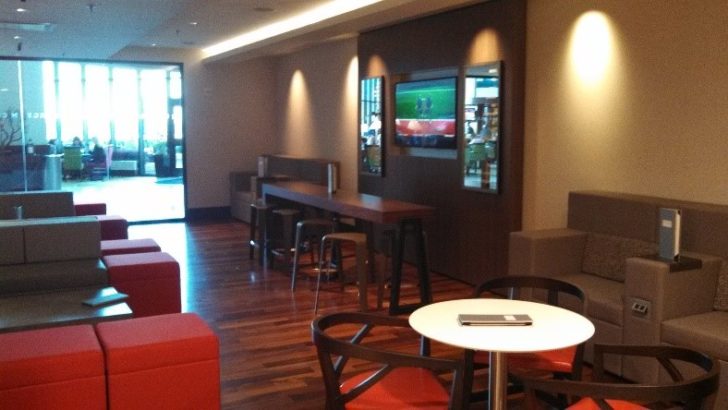 a room with a television and a table