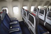 seats in an airplane with windows